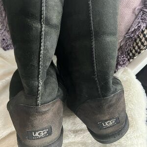 Well loved Uggs black size 11 great for around town or ranch